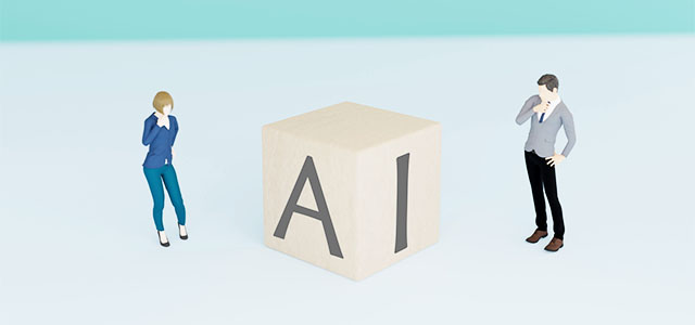 AIと書かれた積木と2体の人形